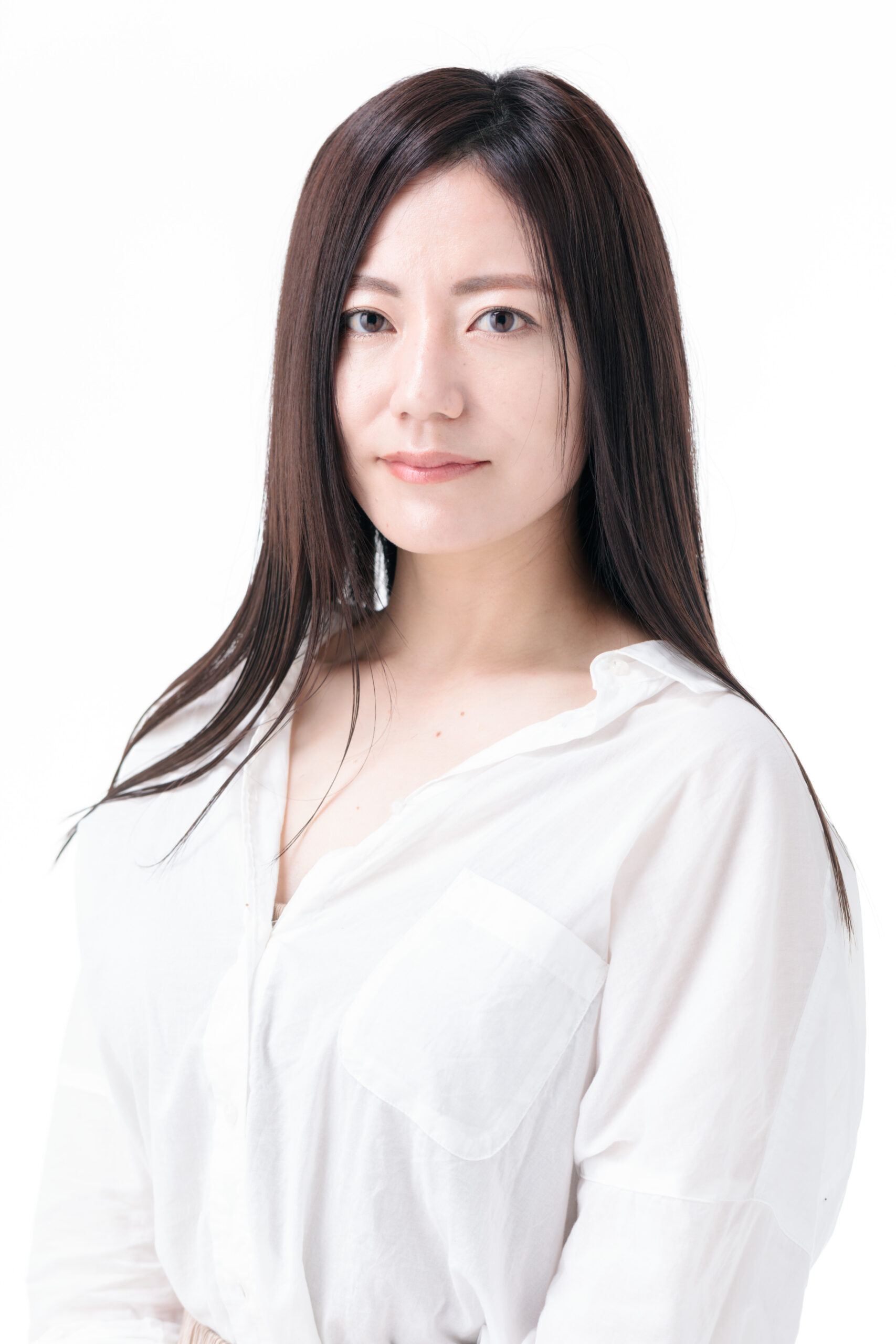 岡山で夏の紫外線ダメージを髪質改善でケアする女性の美しい髪